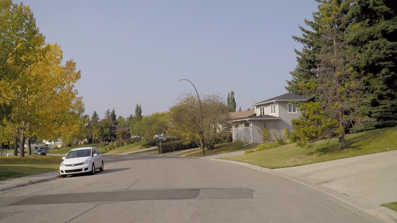 Driving in CALGARY Alberta Canada. University Area to Dalhousie Neighbourhood. Northwest of City.