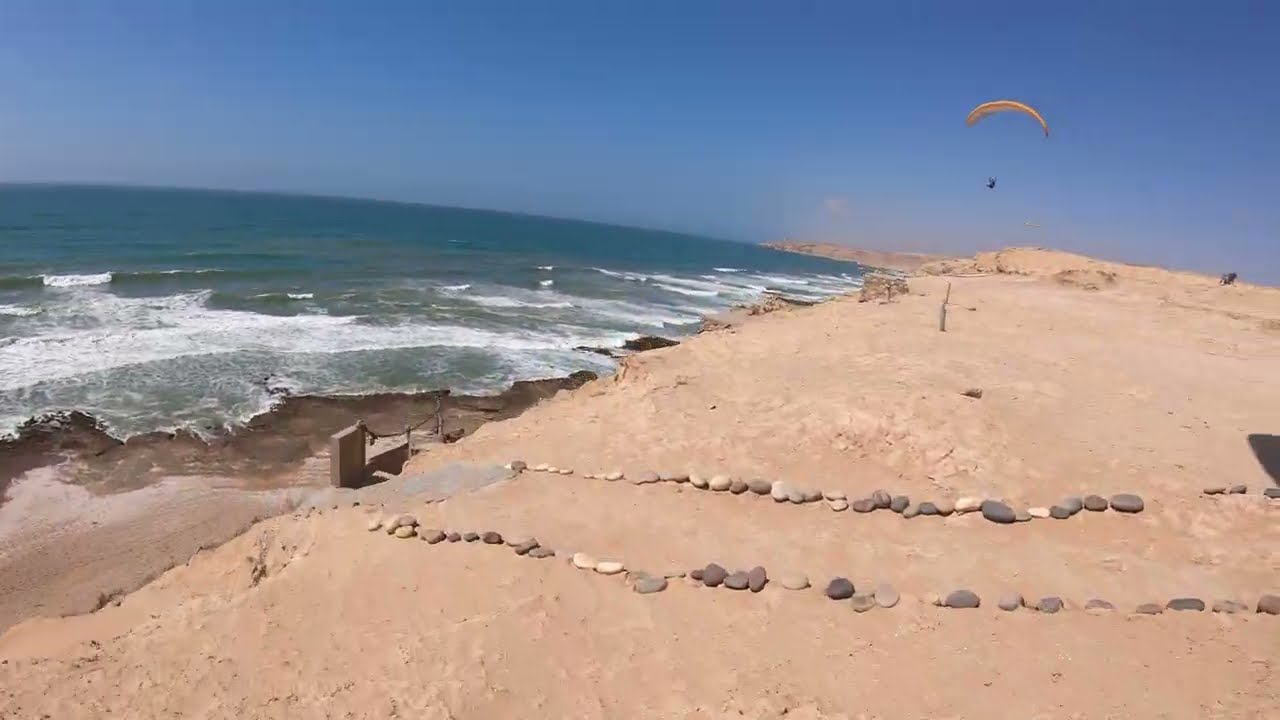 Aglou beach Morocco paragliding over clliff 4K