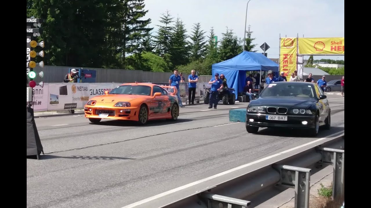 BMW 540i E39 4.4K vs 2JZ Toyota Supra Mk4 1/8 mile drag race
