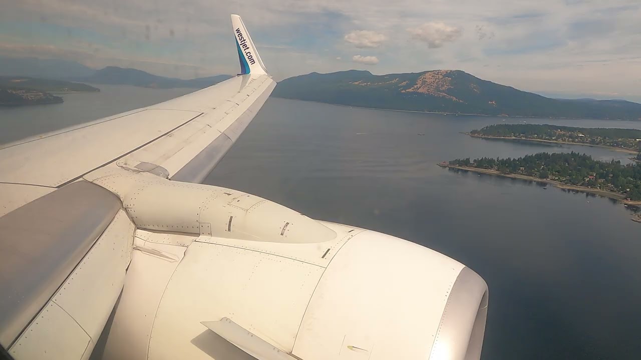 Westjet 737-700 with a beautiful landing into Victoria International Airport(YYJ)
