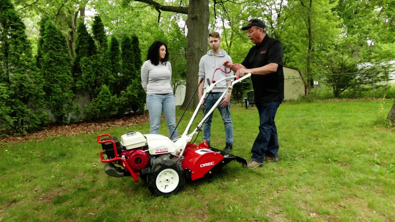 Gardening Newbie is Taught How to Use a Garden Tiller
