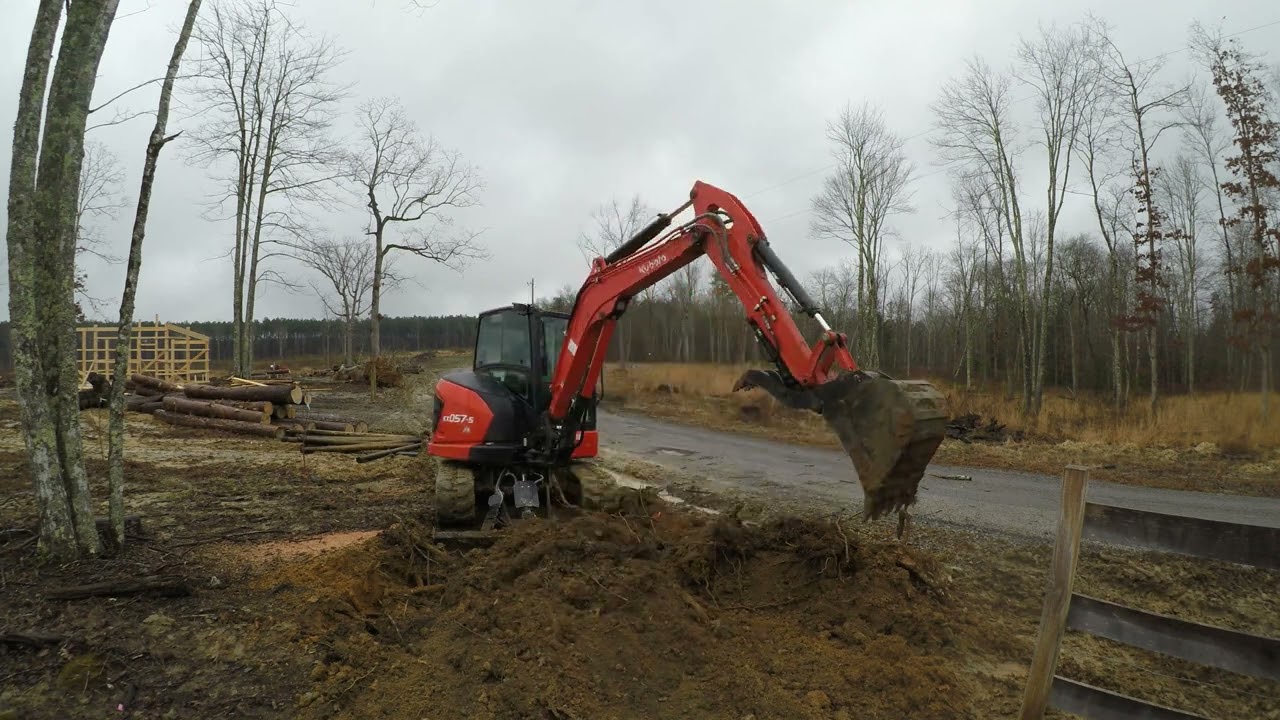 Kubota KX057-5 Rain Day