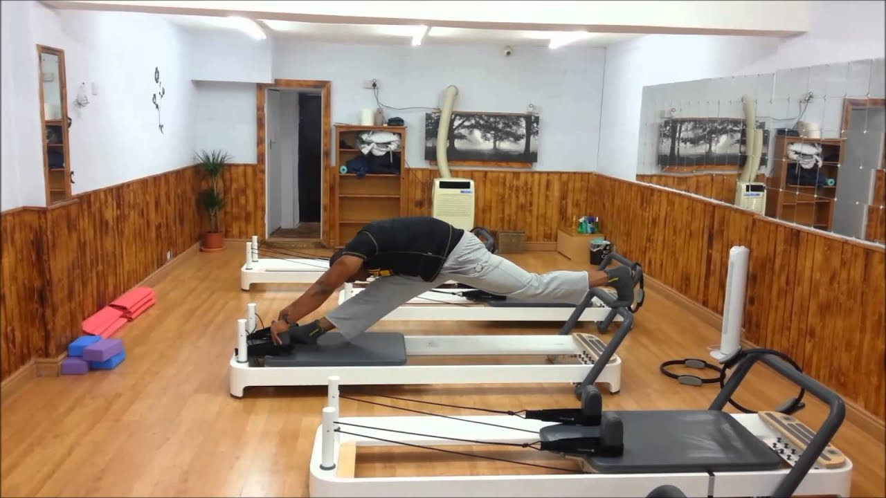 A short routine on the reformer. Flowing Body Pilates