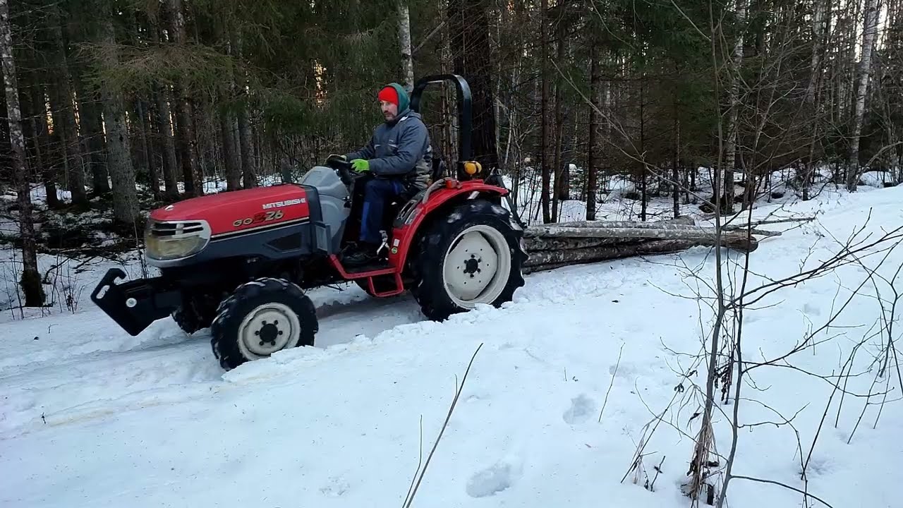 Timber harvesting in winter with winch and tractor #tractor #forest #winch #timber #mitsubishi