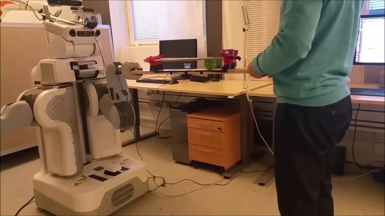 A Sensorimotor Reinforcement Learning Framework for Physical Human-Robot Interaction