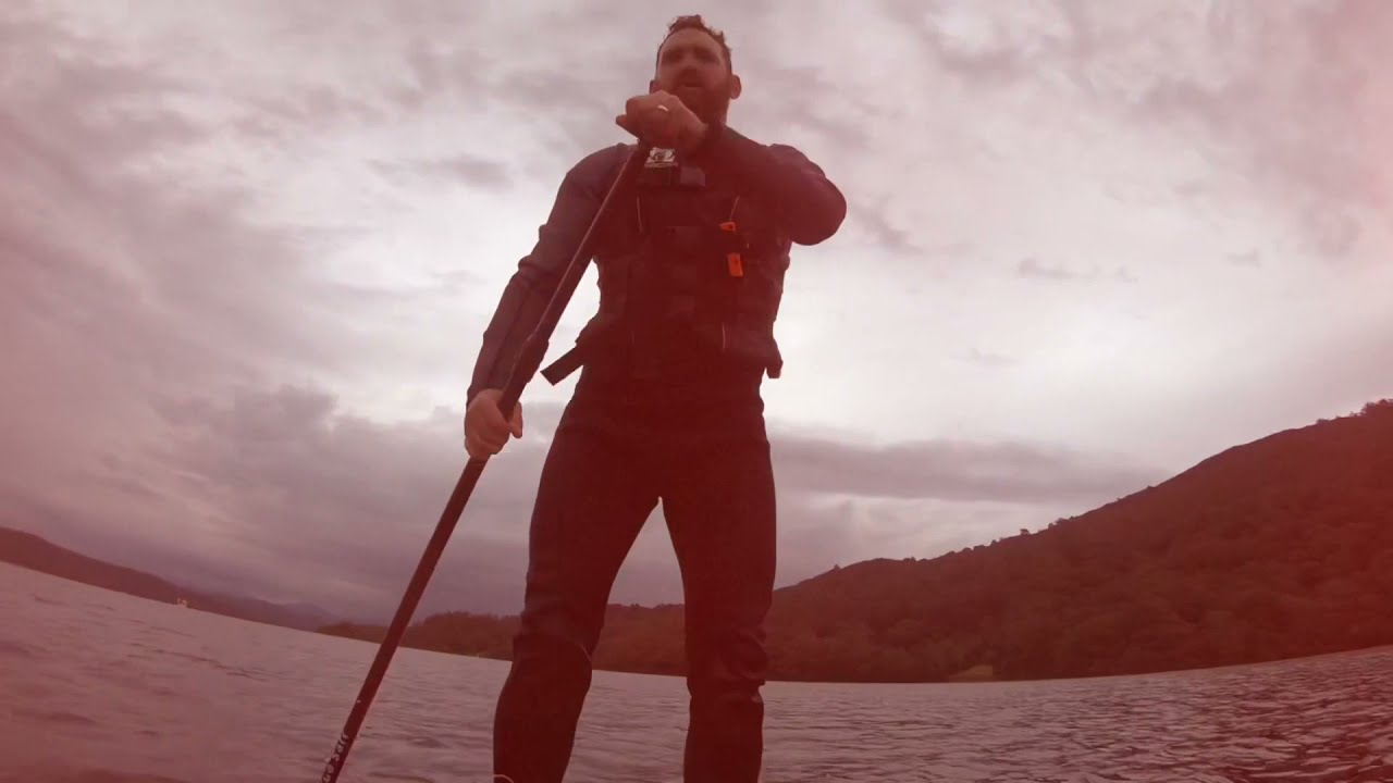 Paddle boarding lake Windermere and an island camp.