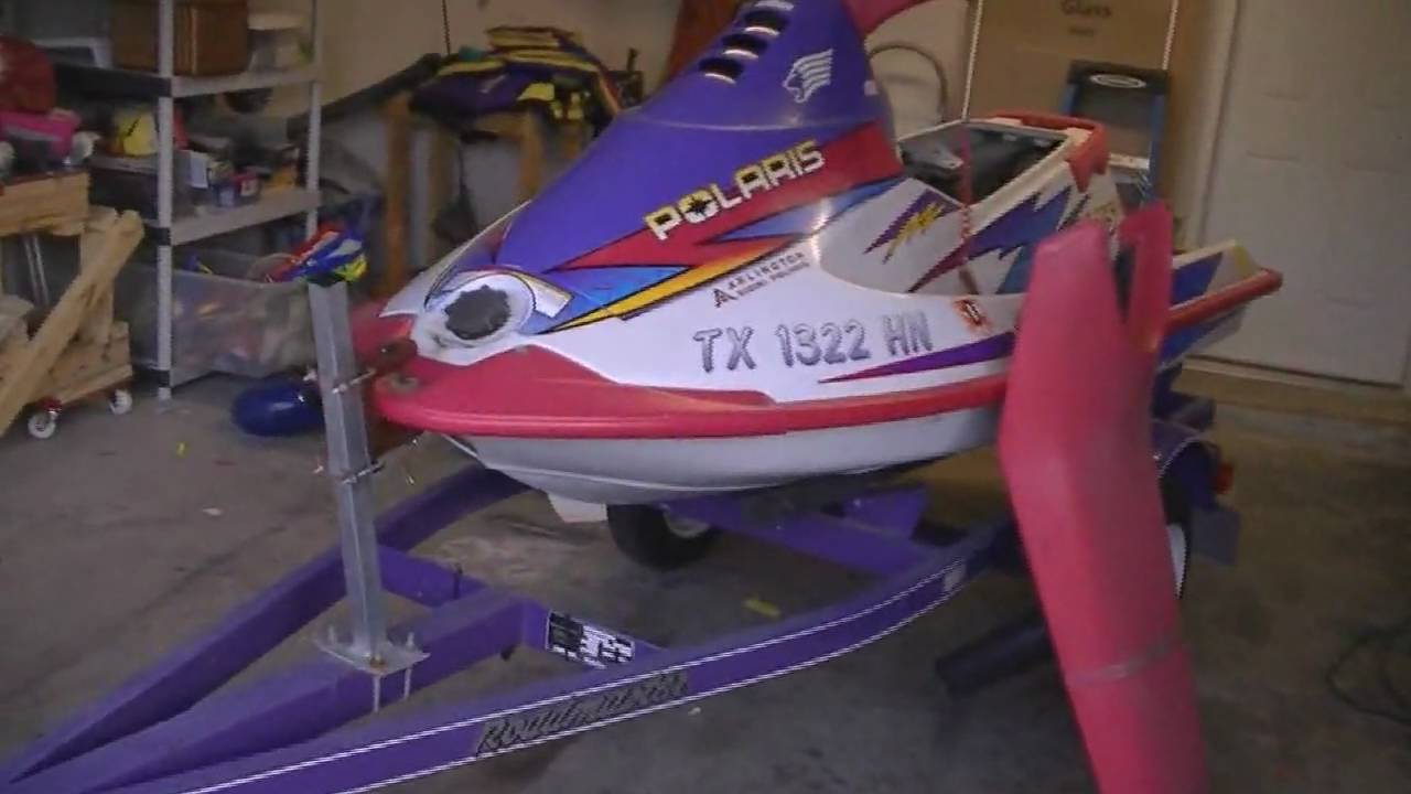 The Final touches on the Polaris SL 750 Jet Ski.