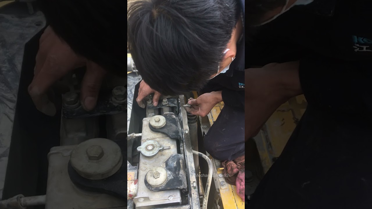 Repair Komatsu 200-8MO high oil temperature cleaning radiator.