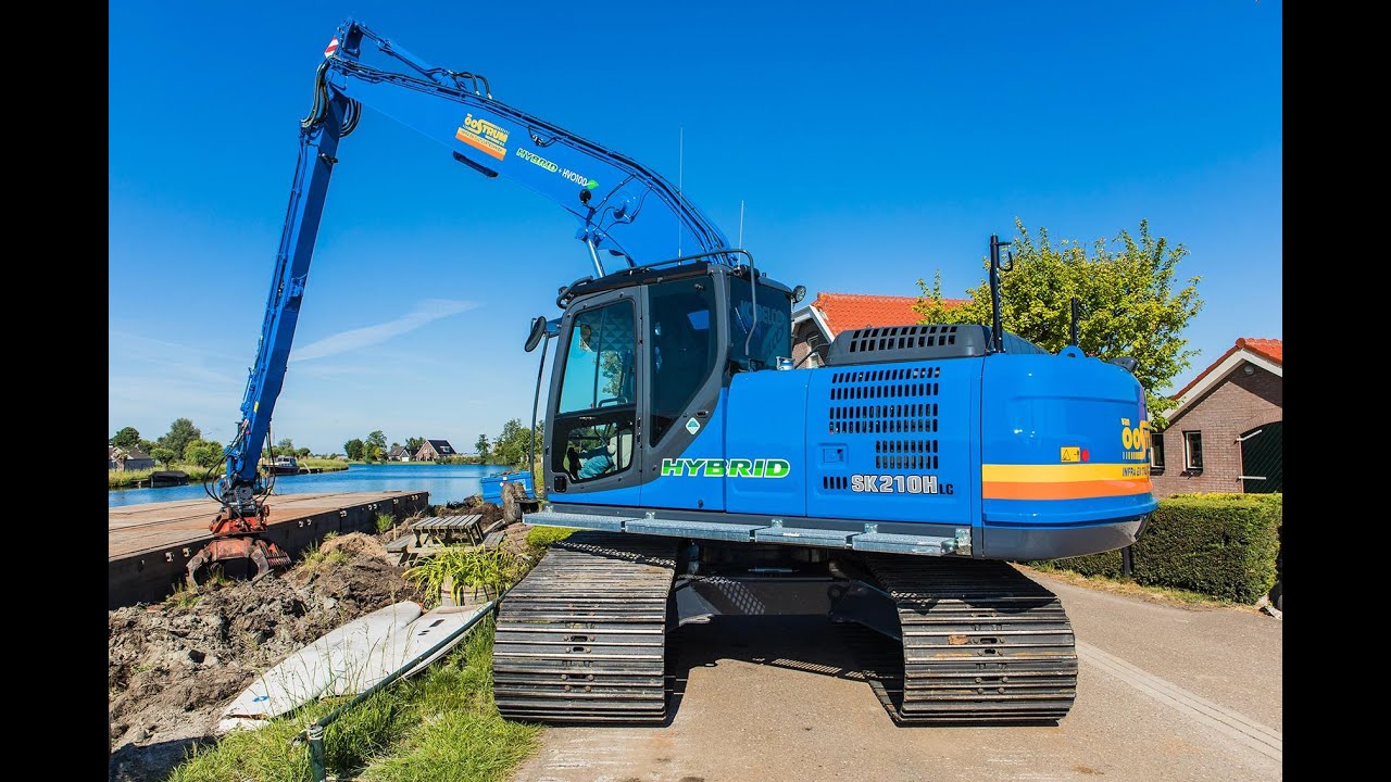 Kobelco SK210LC-10 HYBRID+HVO100 Long Reach voor Van oostrum Westbroek B.V.