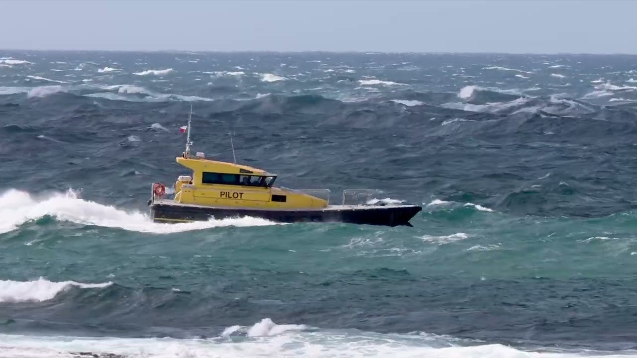 Pilot launch Griffiths goes thru the heads off Point Lonsdale, Victoria, Australia.