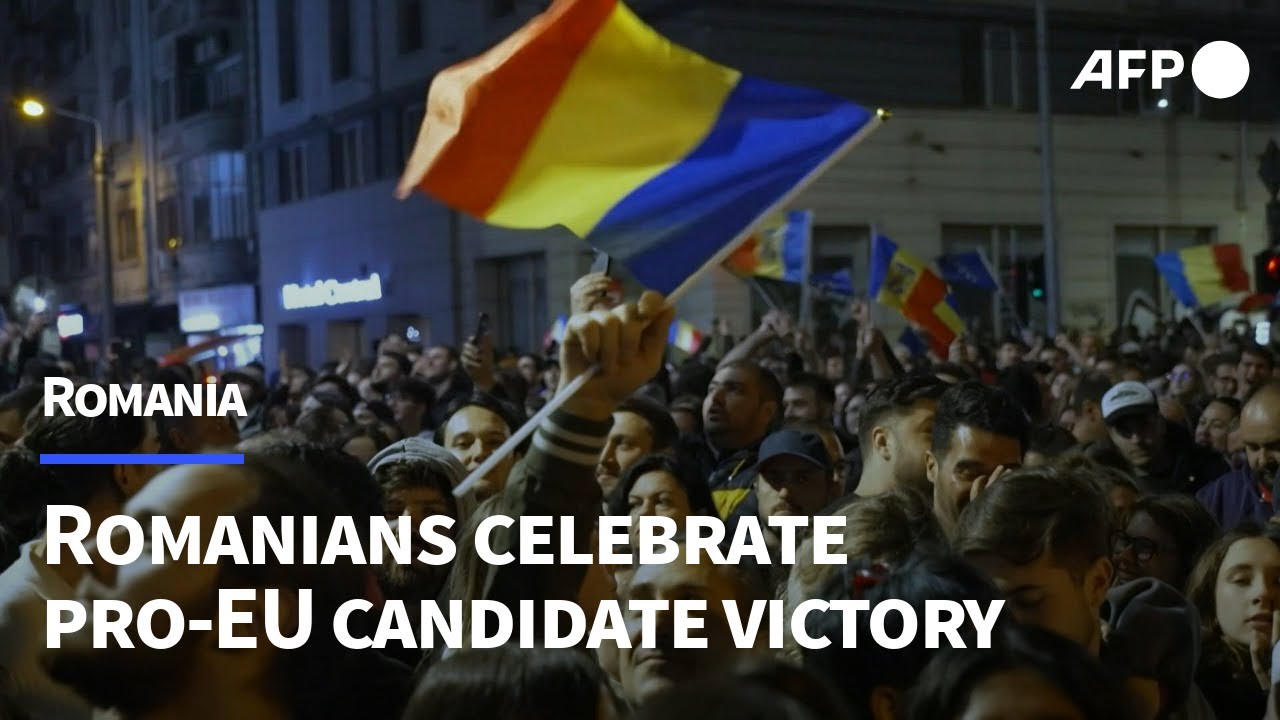 Romanians celebrate victory of pro-EU candidate in presidential elections | AFP