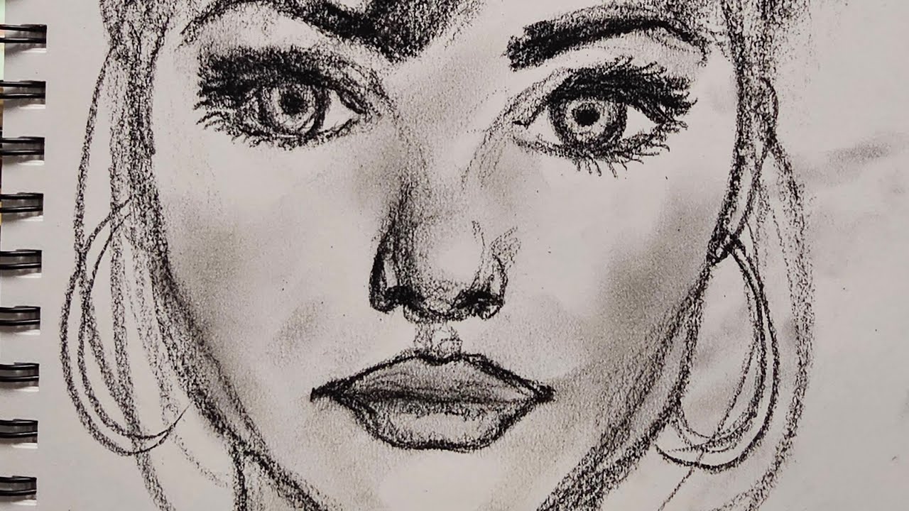Head sketches drawn with charcoal