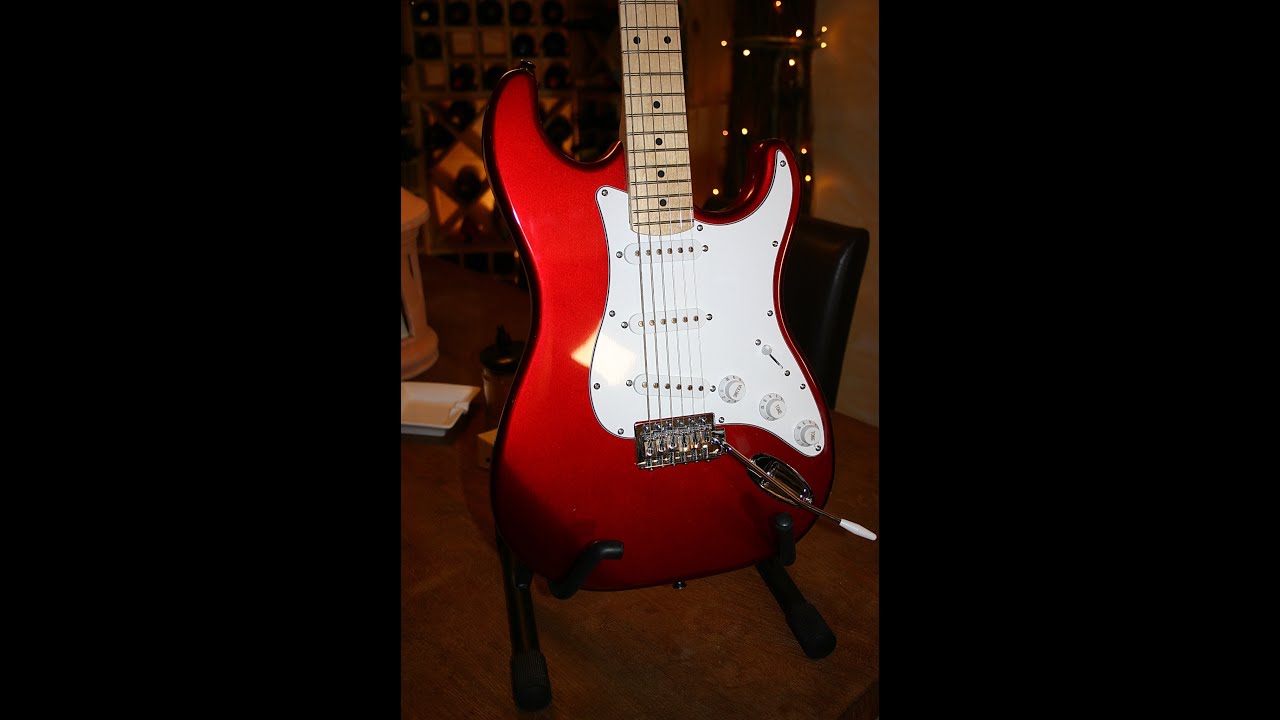 77€ Harley Benton ST 20 Candy Apple red. How does it sound with the Kemper and a Soldano profile?