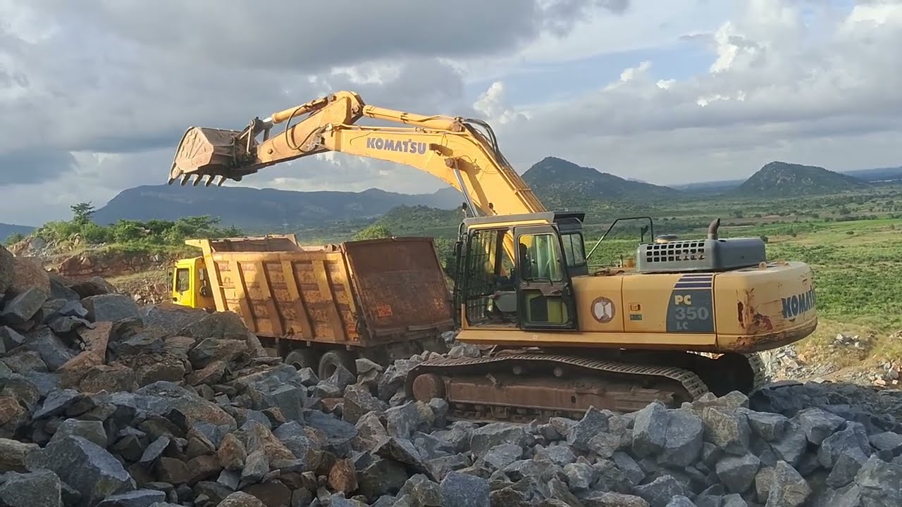 Komatsu pc-350 loading by tipper