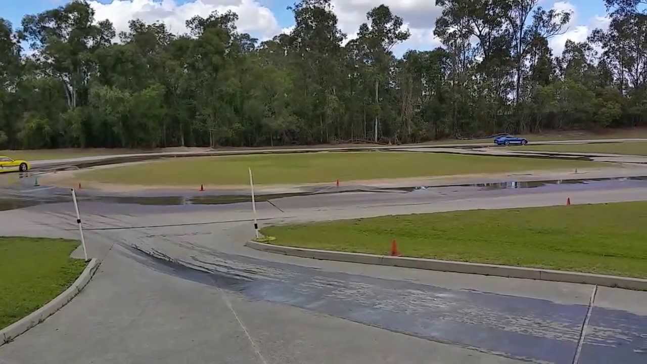 Porsche 911 & Cayman Powersliding at Mt Cotton Training Centre