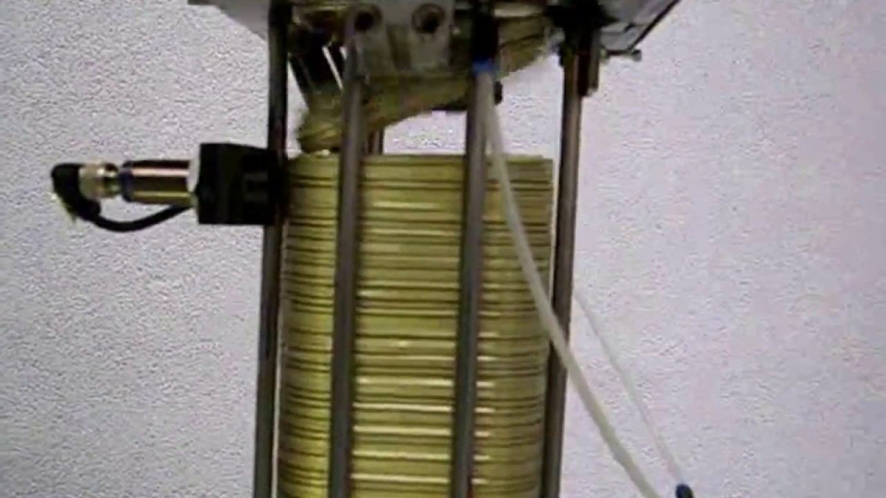 Vacuum downstacker for aluminum lids