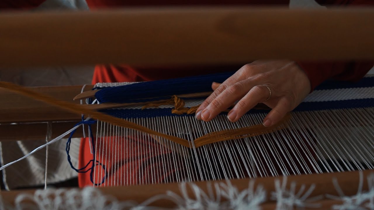 Weaving in the Loom to create Greek Handmade Crafts