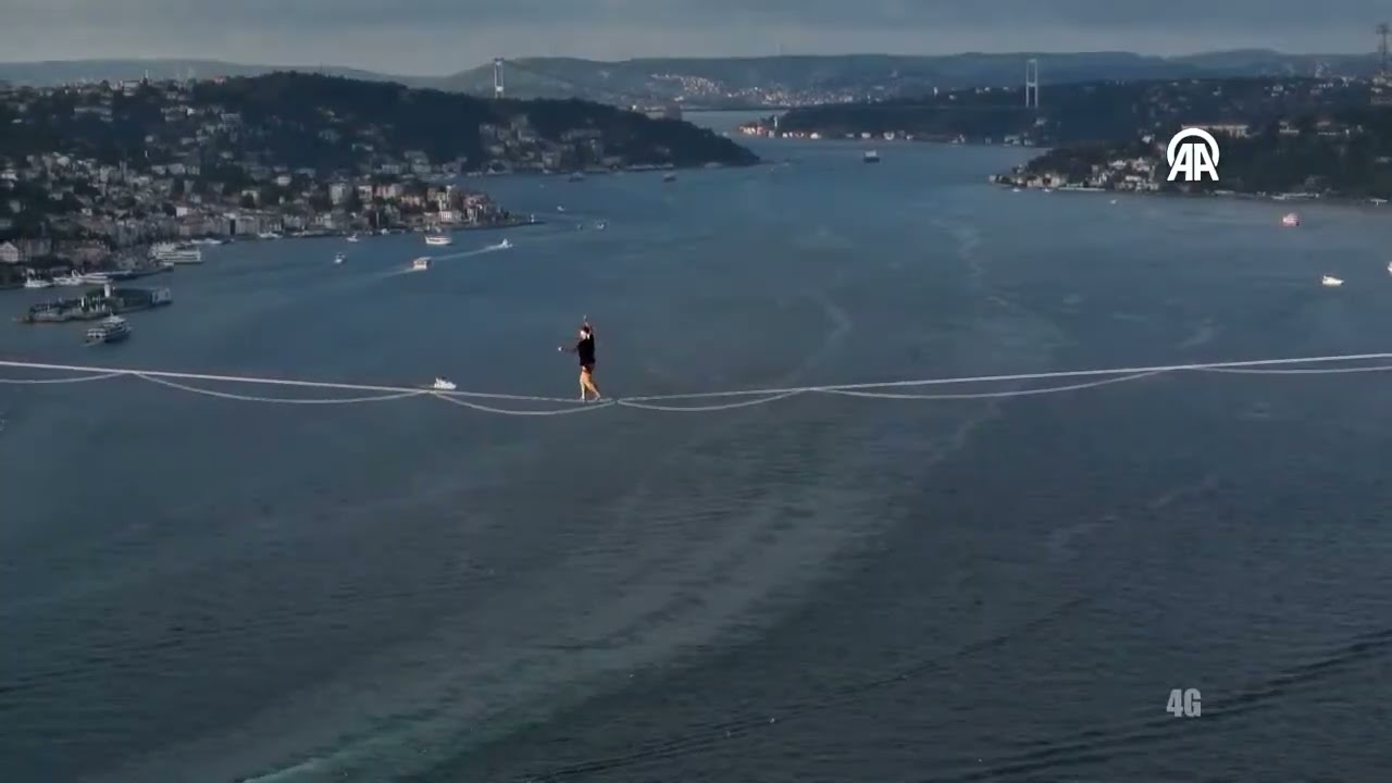 Red Bull athlete Jaan Roose walks tightrope from Asia to Europe over bridge in Türkiye's Istanbul