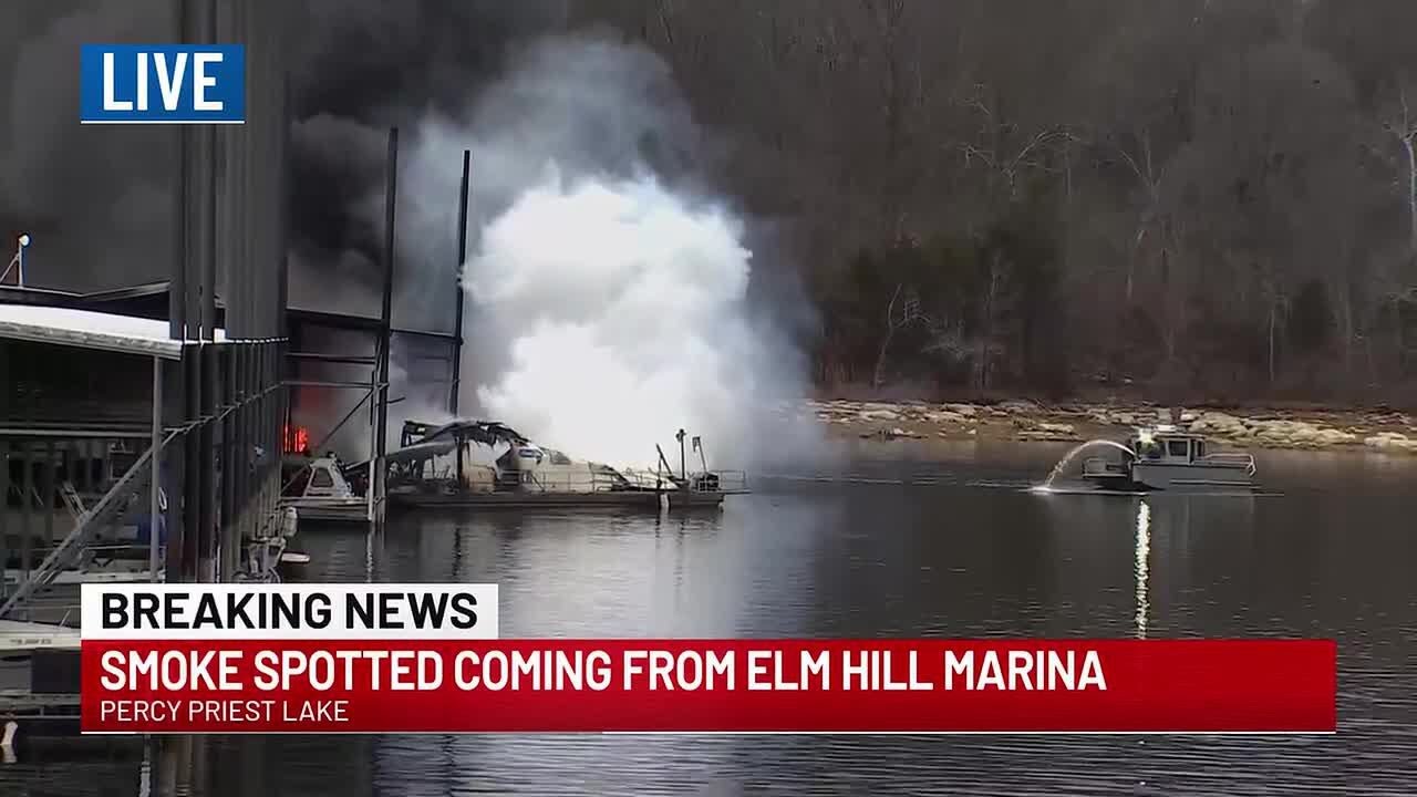 Boat dock catches fire at Elm Hill Marina