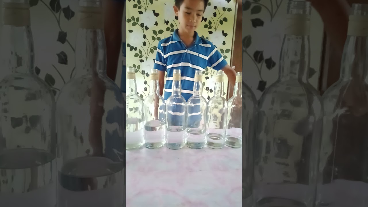 Improvised musical instruments using bottles for Do Re Mi Fa Sol La Ti Do