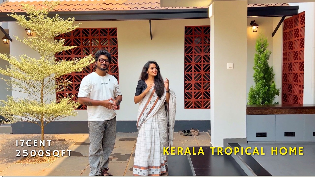 ഇത് രണ്ട് കൈകളിലും ഒതുങ്ങുന്ന രണ്ടുനില വീട് ! A TRADITIONAL DOUBLE - STOREY HOUSE!  ARCHiTALKS HOMES
