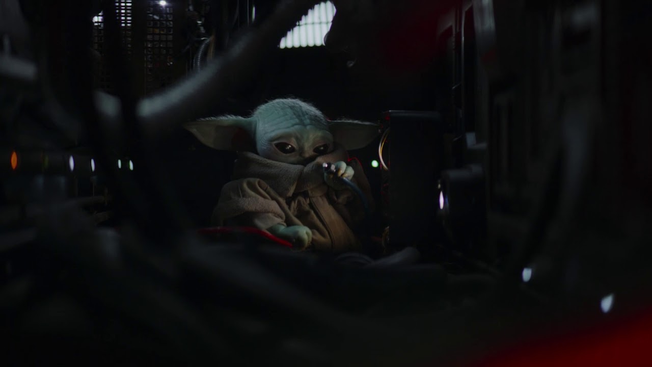 Grogu trying to repair the ship.