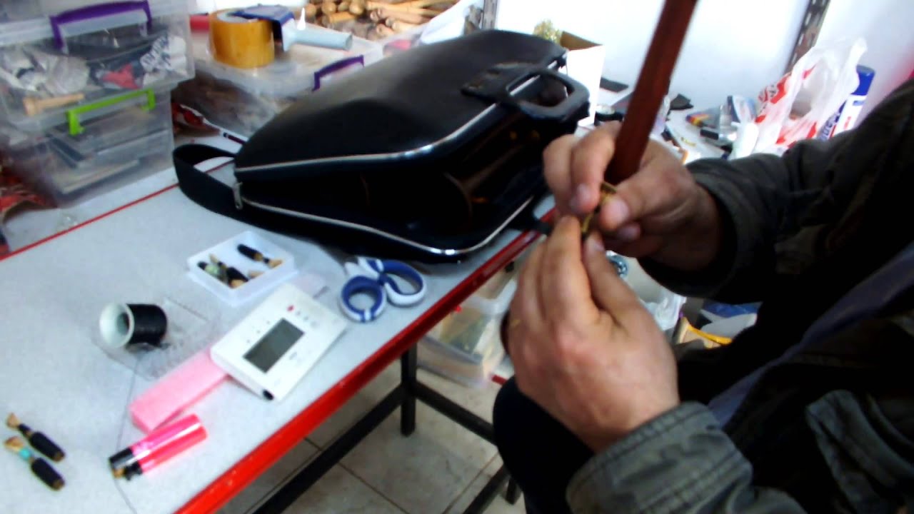 Heating the zurna reed with light shaping , preparing it to play