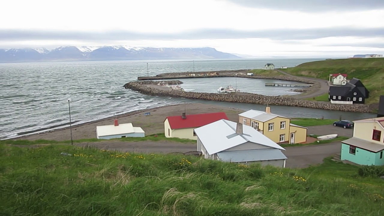 View of Hofsos harbor in Iceland on windy, cloudy day
