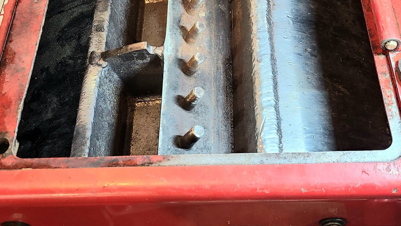 Wood chipper repair. Stud replacement.