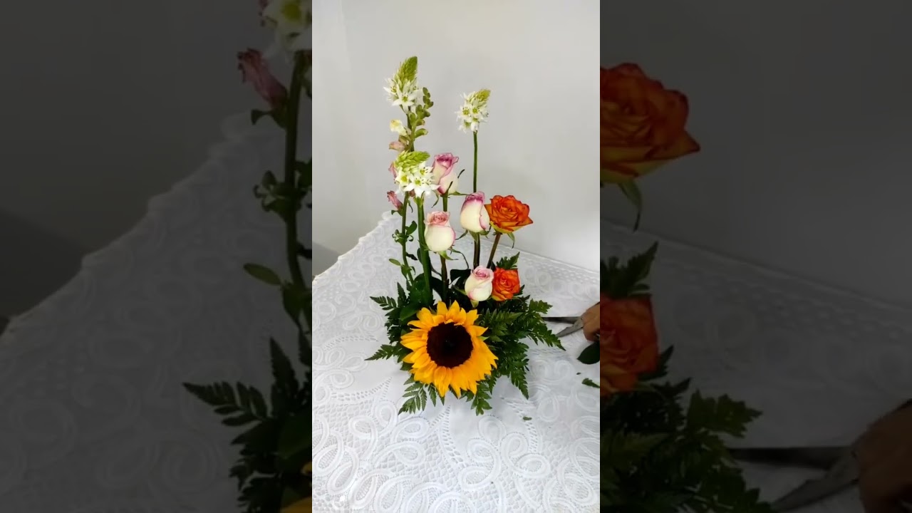 Cute natural flower and sunflowers centerpiece