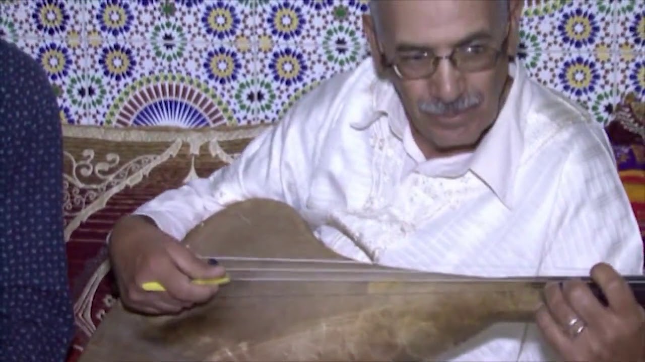 معزوفة على الوتار لحسن أومامة