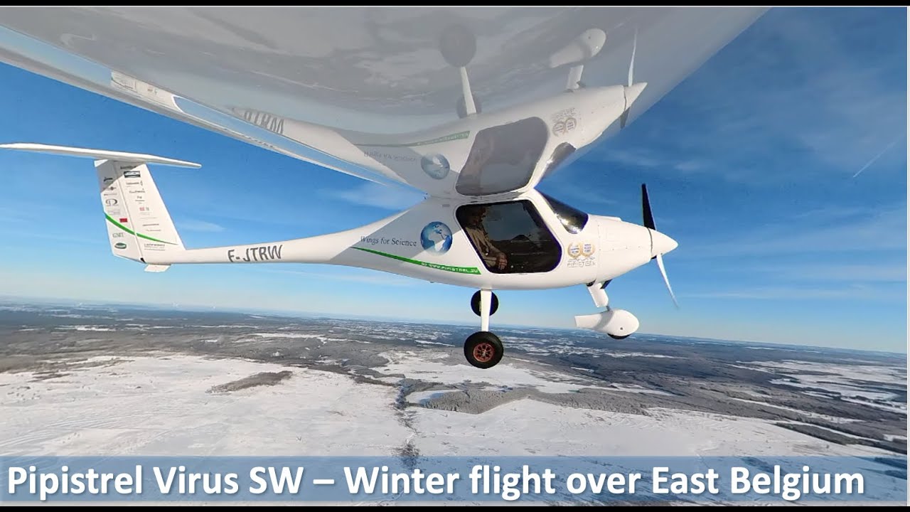 Flight over snow covered East Belgium   HD 1080p