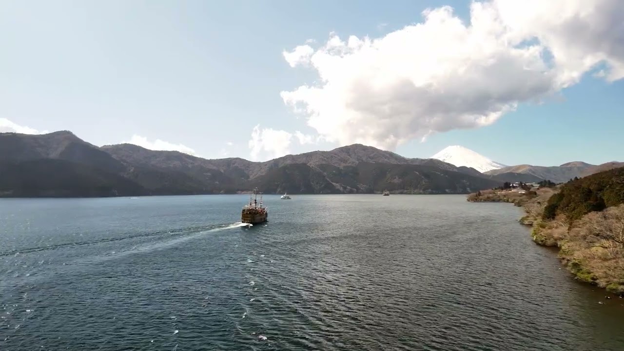Hakone, Kanegawa, Japan. Heiwa no Torii. Mt. Fuji .  DJI Mini 4 Pro 4k Drone chasing a pirate ship