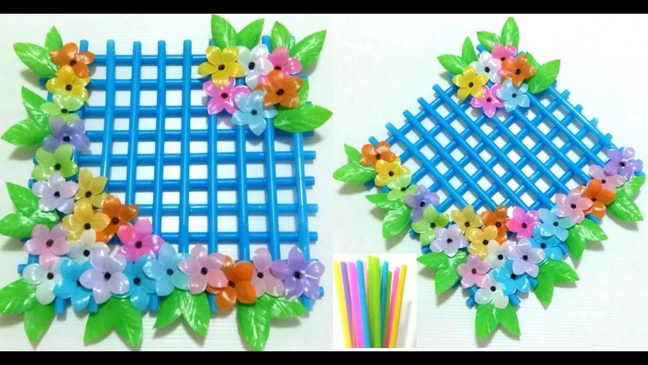 ดอกไม้จากหลอด ทึ่แขวนตกแต่งฝาผนังจากหลอด by มายมิ้นท์ Hanging on the wall from the straws.
