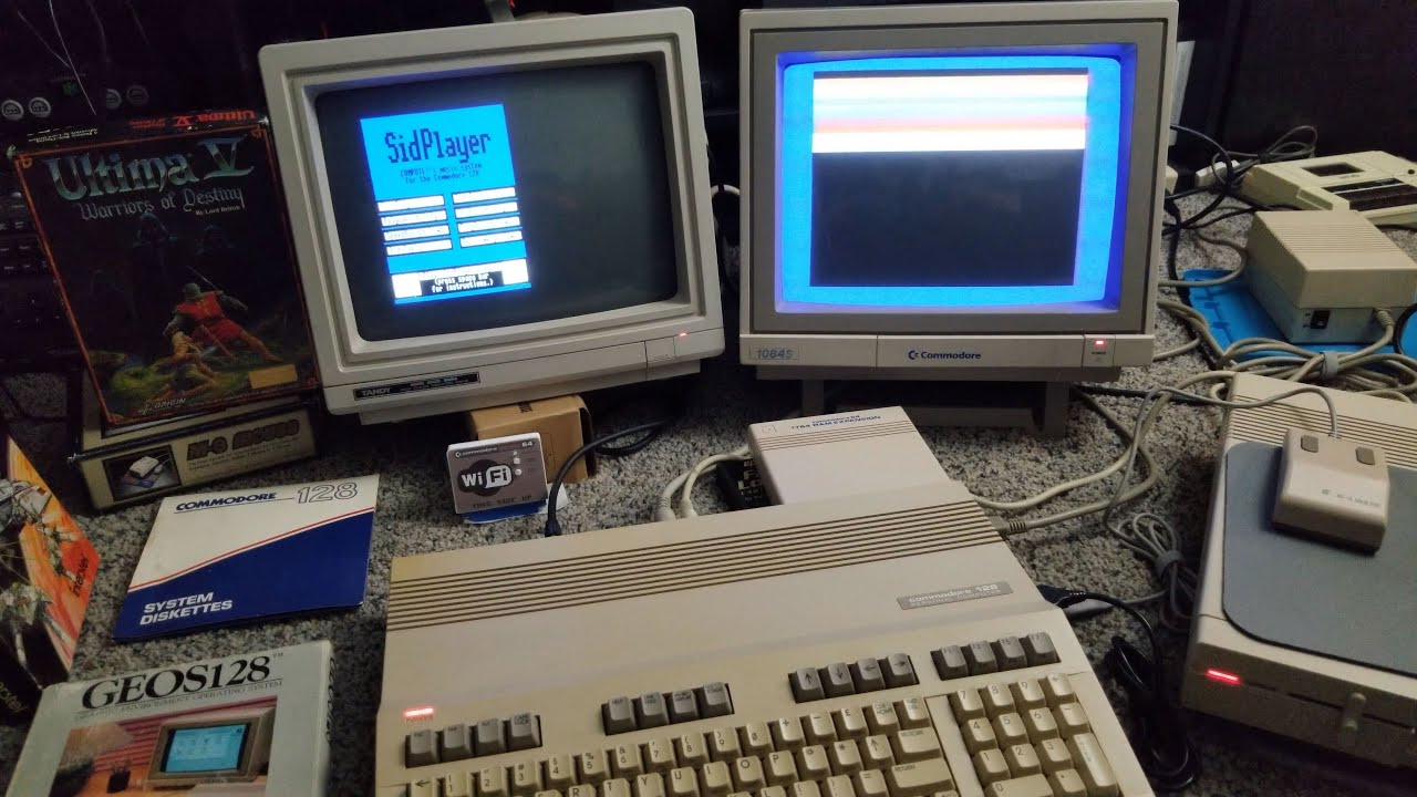 Commodore 128 40 vs 80 column display with Enhanced SidPlayer c128 and c64 demo
