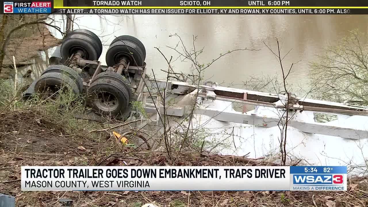 Truck driver recovering after being trapped in water