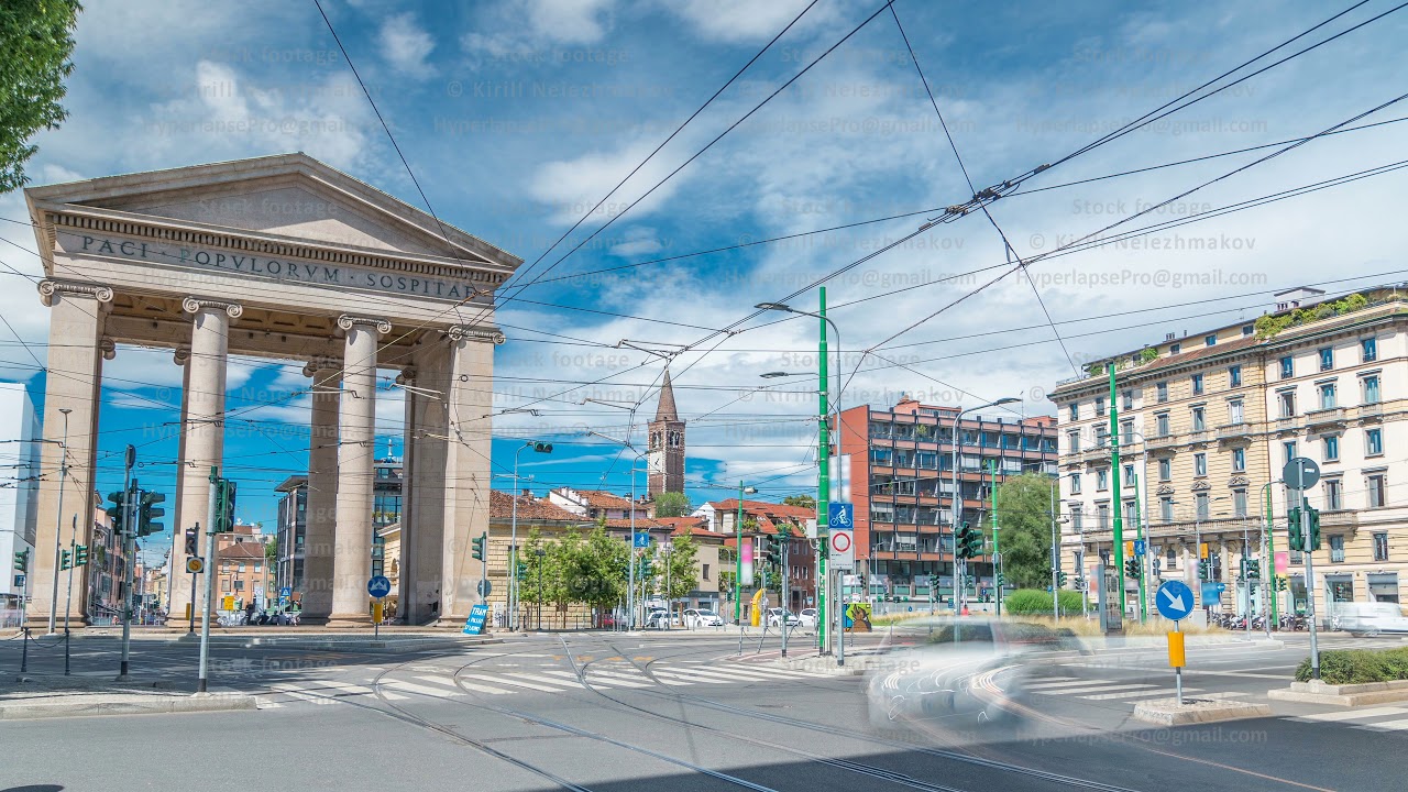 Street view on Ticinese city gate and tram timelapse in Milan