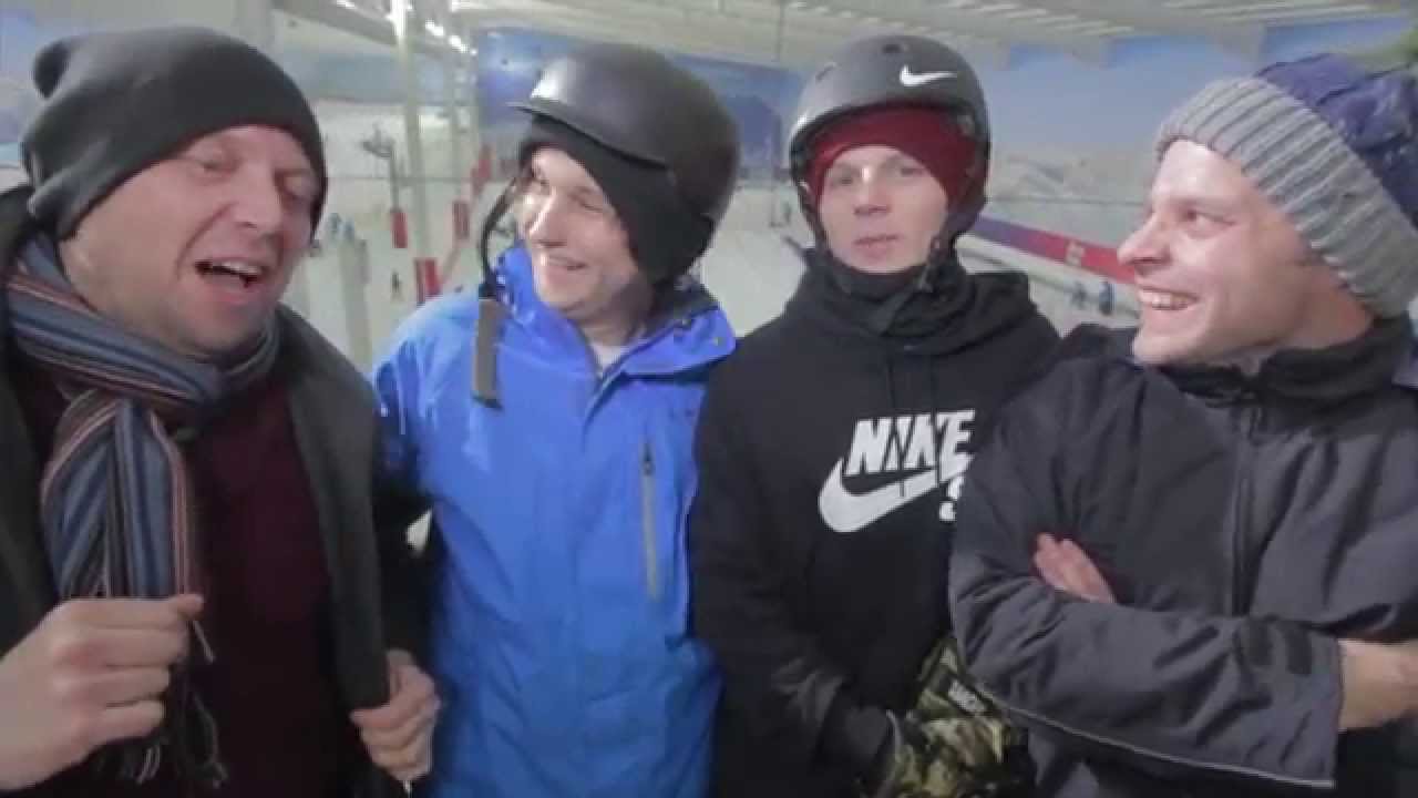 Jamie Nicholls helps Geoff and Luke learn snowboarding