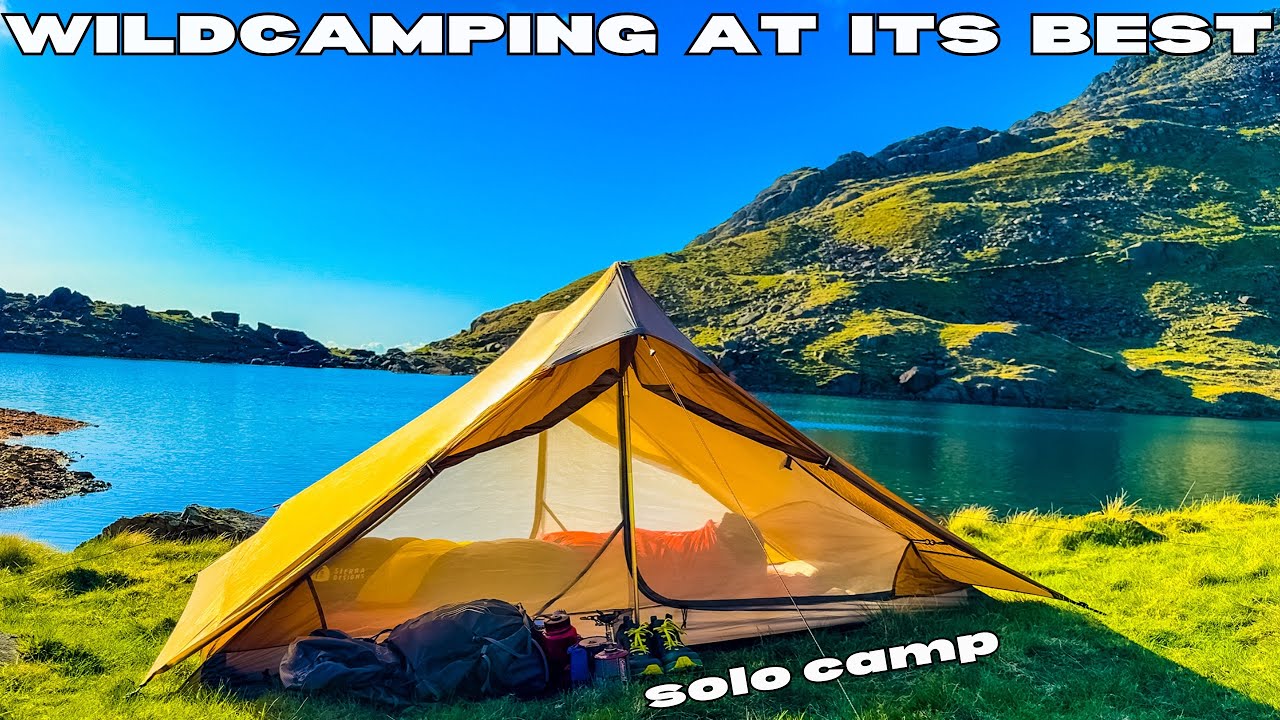Camping by a tarn high in the mountains
