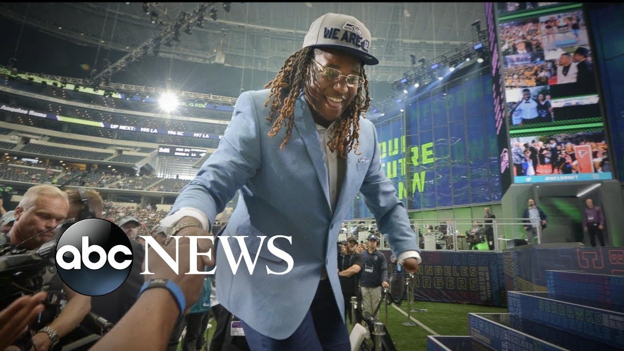 NFL draft pick celebrating an unbelievable triumph against the odds