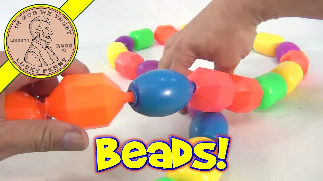 Vintage Fisher-Price Colorful Shapes Plastic Baby Snap Lock Beads
