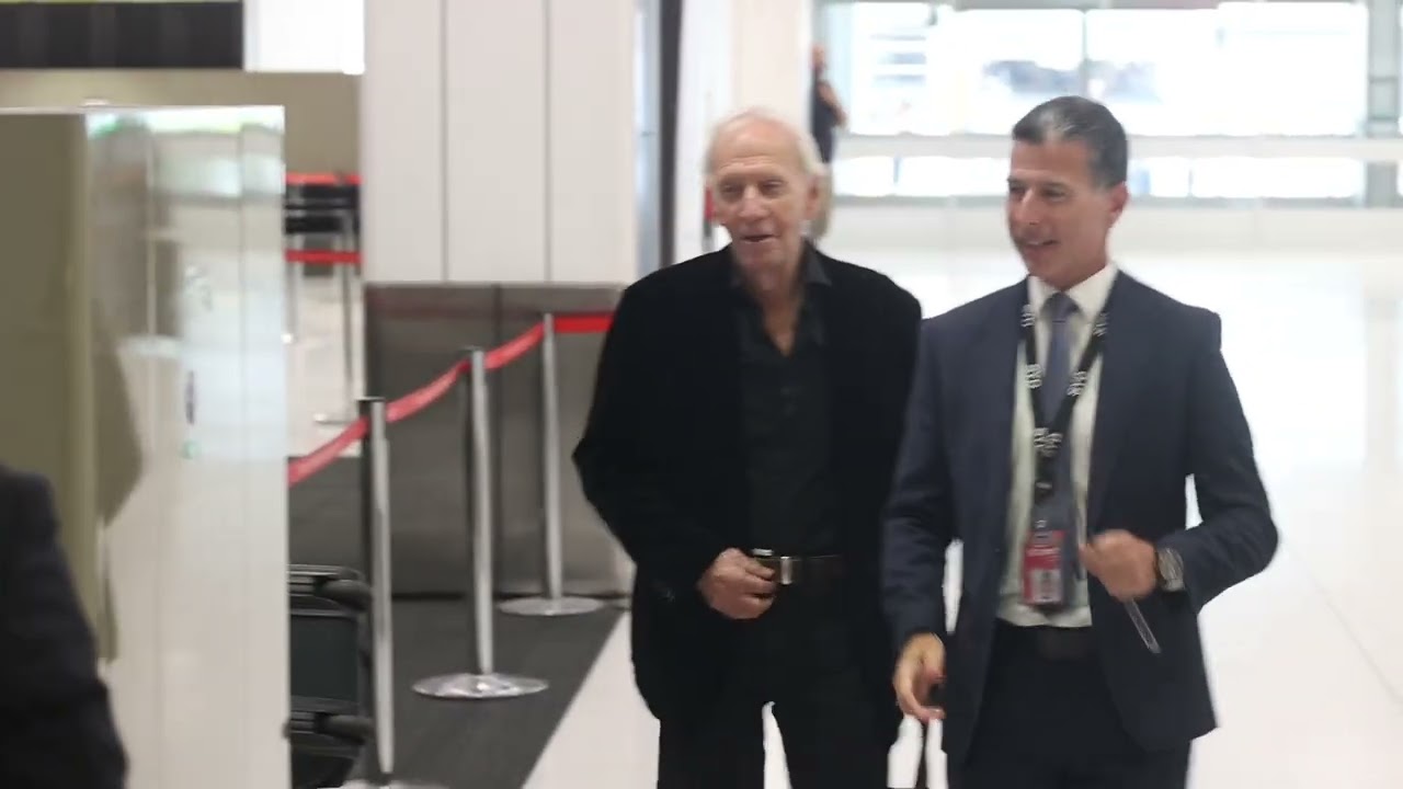 Paul hogan departs Australia
