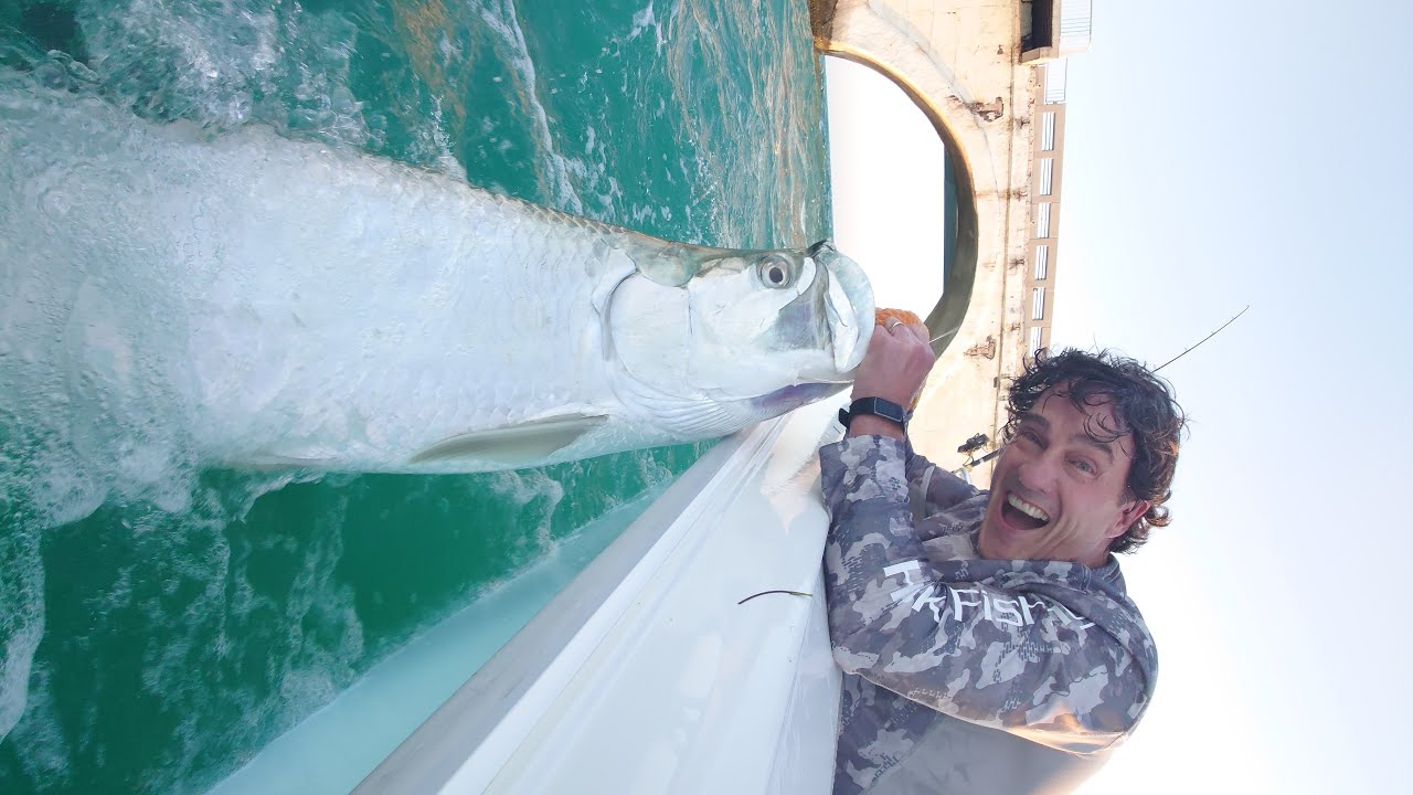 Glen catching a trophy tarpon at Long Key Bridge!  April tarpon fishing in the Florida Keys!