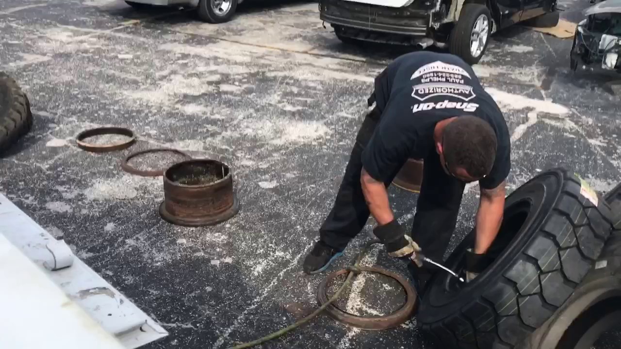 Changing 8.25-15 tires on an industrial forklift (Full Video)