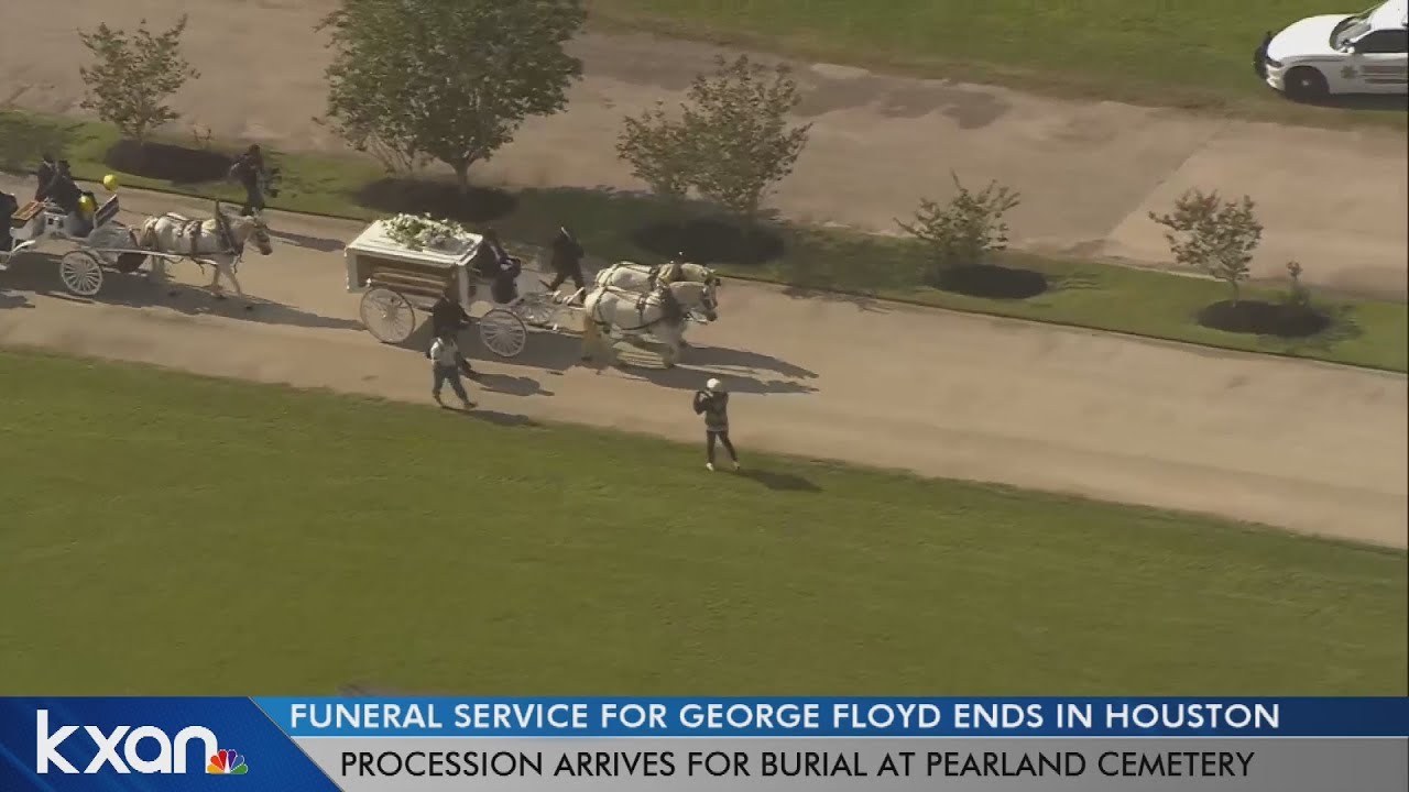 George Floyd's casket arrives at cemetery in horse-drawn carriage