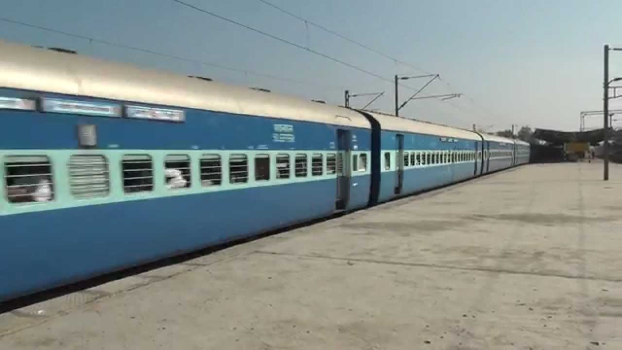 INDIA'S FASTEST 24 COACH TRAIN SLIDING PAST KELVE ROAD STATION