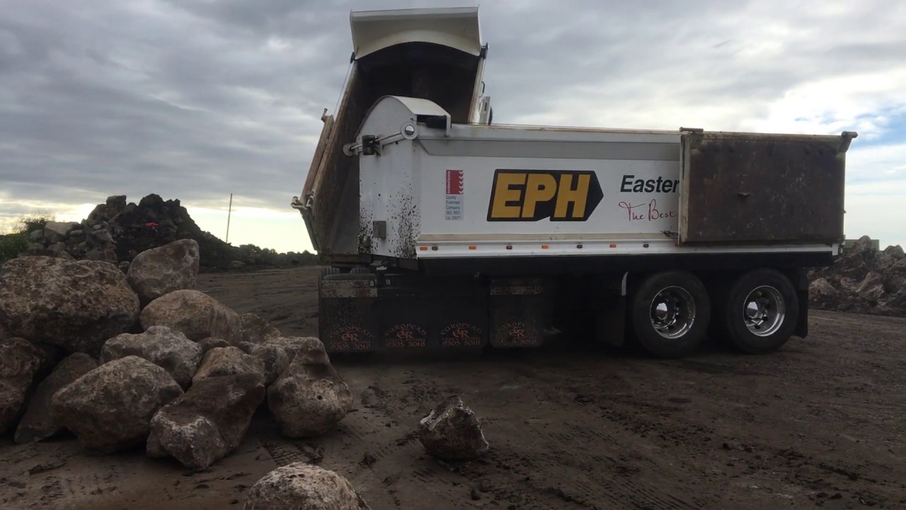 EPH Truck & Super Dog Trailer tipping rock