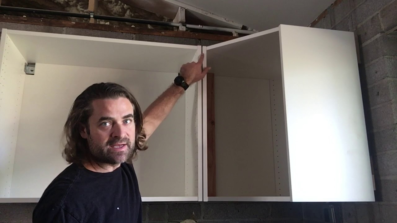 Hanging Upper IKEA Cabinets - EP57 - DIY How To Remodel Your Home - Stonehaven Kitchen Build Part 13