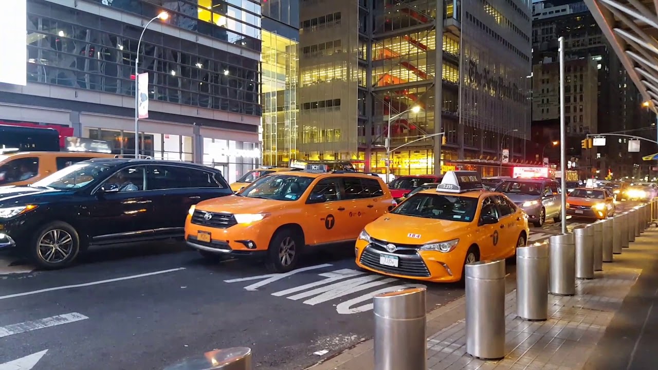 Evening rush hour traffic at 8th avenue - 42nd street in Manhattan - New York (traffic, ambulance)
