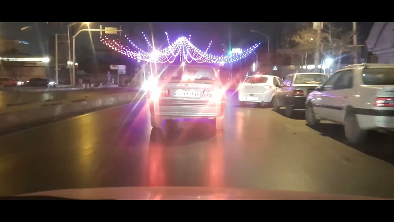 CITY DRIVING AT NIGHT.SERENE AND RELAX IN MASHHAD DRIVE.INTERSECTION AHMADABAD-ADLEKHOMEINI SQUARE.